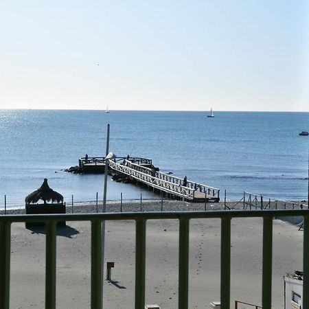 Litus Roma Hostel Lido di Ostia Exterior photo The pier at the end of the promenade